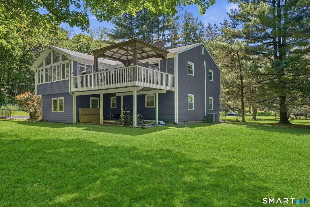 Stunning, completely updated 4 bedroom home with flexible floor plan offering potential for a 5th bedroom, home office, or guest space !