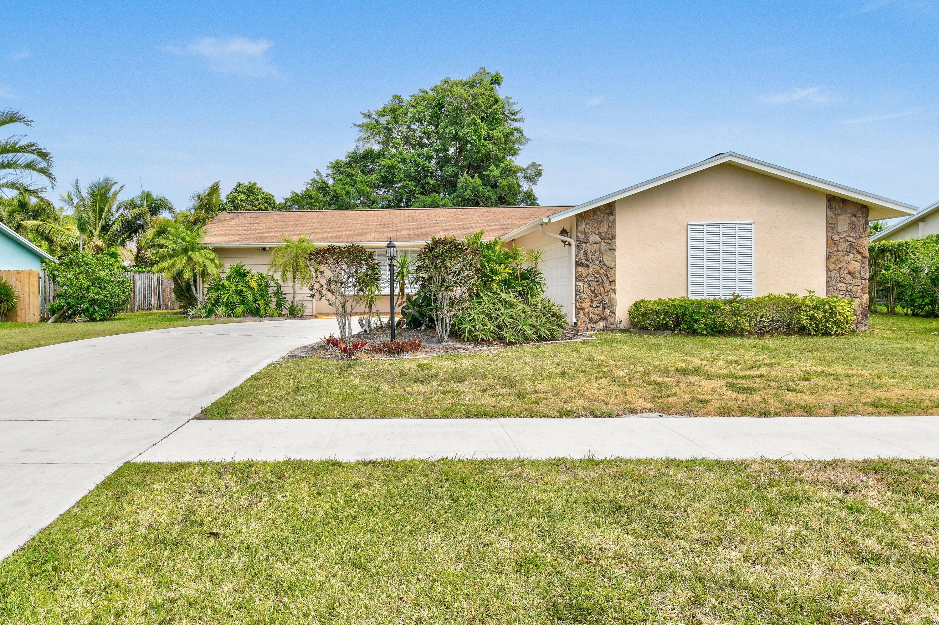 This exceptional residence is located in the center of Tequesta !