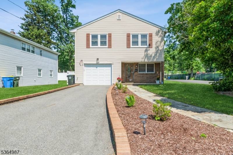 WELCOMING Move in Ready 4 bedroom, 2 full bath, freshly painted split level home !