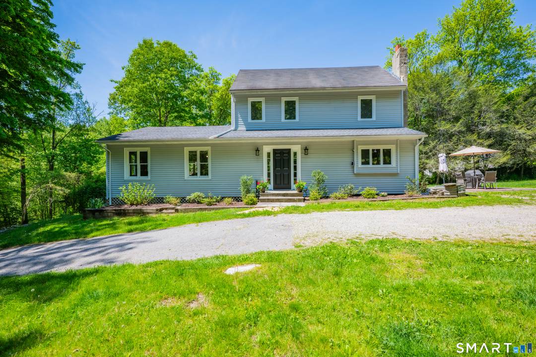 Situated on 4 private acres, this 3 bedroom, 2.