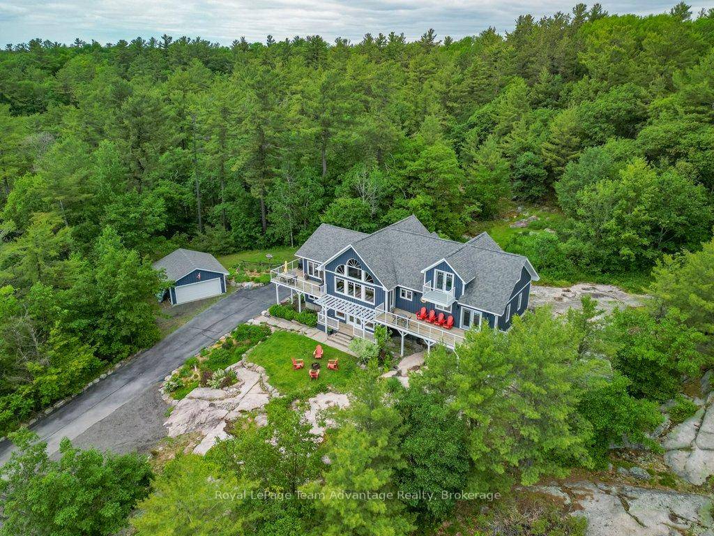 Welcome to 39 Big Sound Road a bright, spacious home with sweeping views of Georgian Bay.