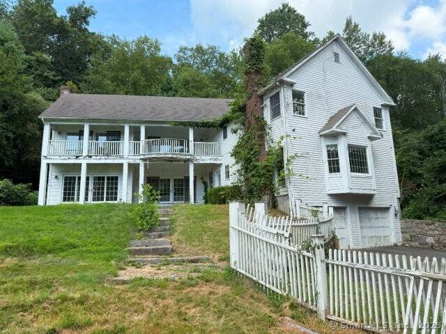 This well appointed Colonial offers four spacious bedrooms and is set on a secluded lot for added privacy.