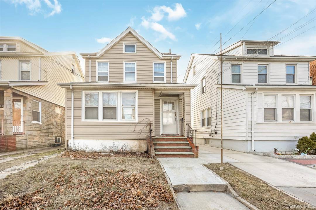 Vintage Legal 2 Family Home with Tons of Potential for you to Renovate to Suit Your Style in Prime Location near Public Transportation, LIRR, and Shopping !