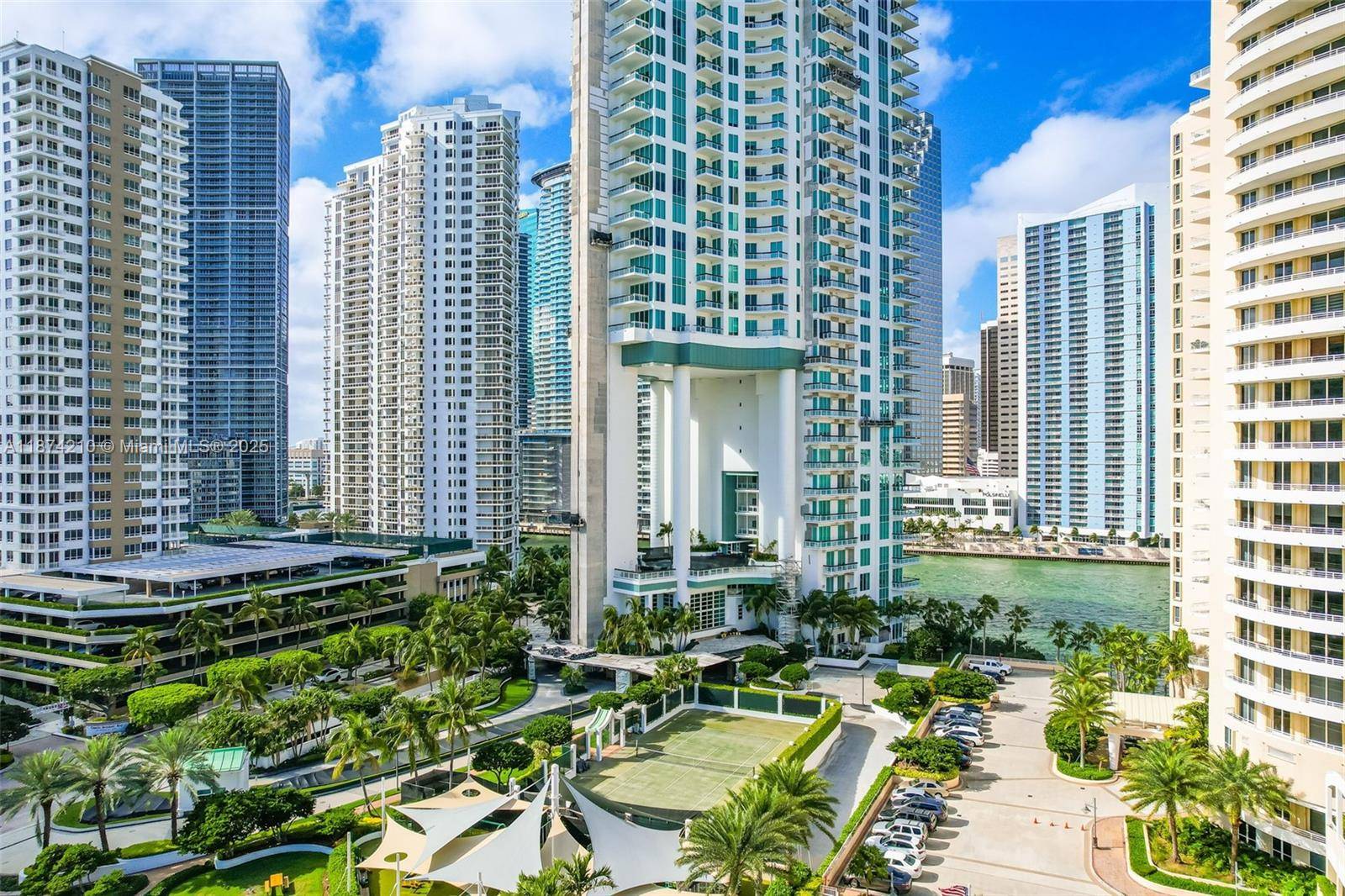 Welcome to Unit 2904 at Asia Brickell Key a rare opportunity to live on a high floor with panoramic views of Biscayne Bay and the Miami skyline.