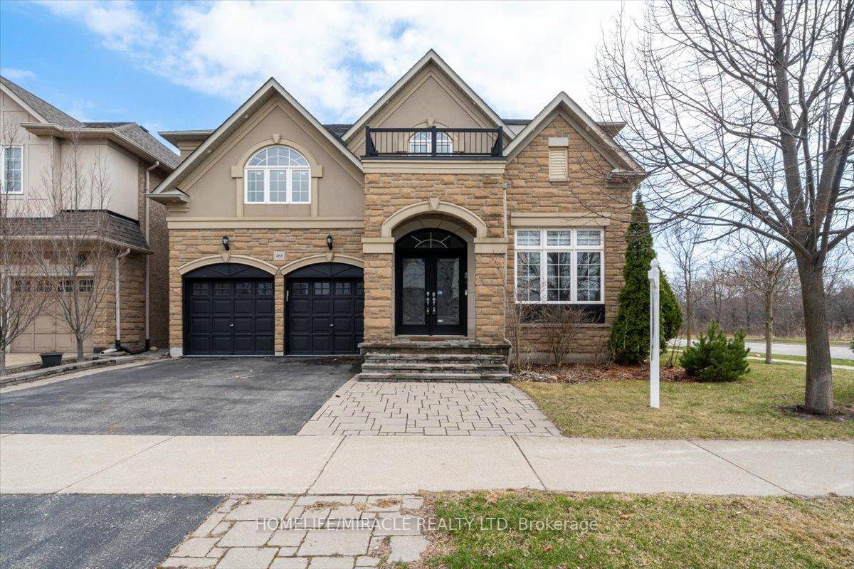 Welcome to this breathtaking executive home offering approximately 4, 500 sq ft of luxury living in the prestigious Lakeshore Woods community.