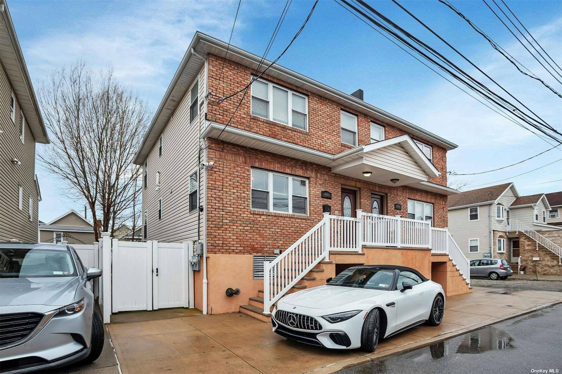 Nestled in the serene and picturesque neighborhood of Hamilton Beach, this stunning diamond condition two family home epitomizes elegance and functionality.