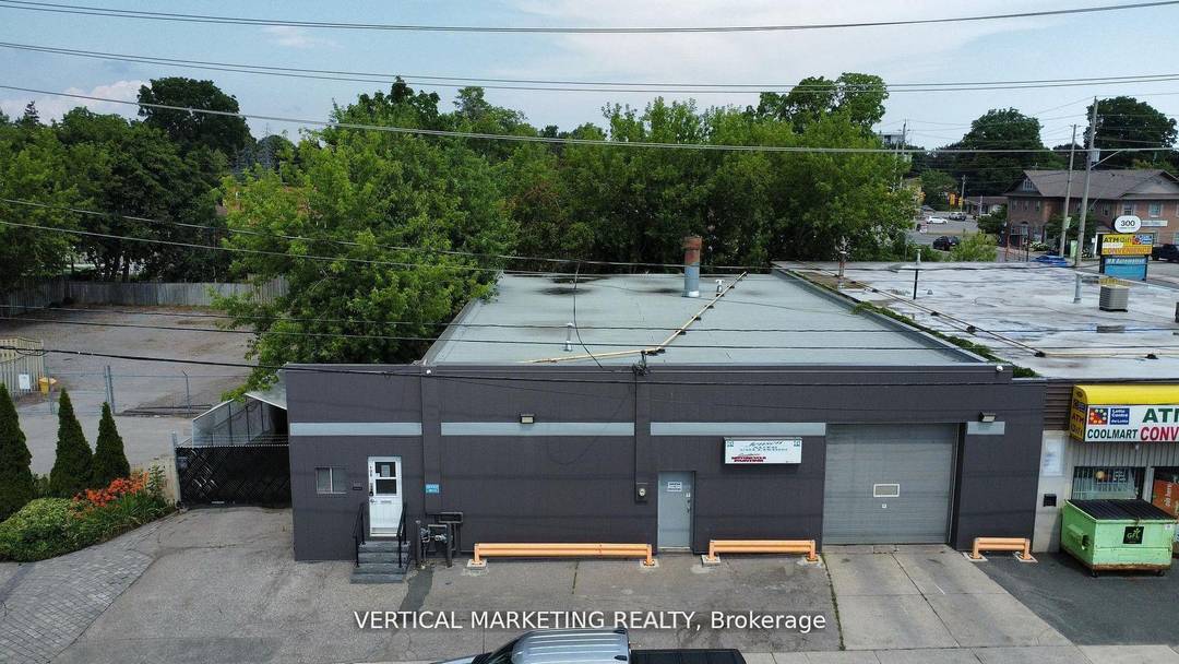 Two adjacent freestanding commercial properties for Sale in downtown Whitby.