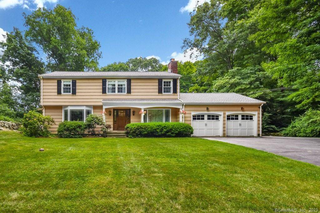 Light and welcoming, completely renovated yet still traditional, New England colonial on lovely North Stamford's Wildwood Road.