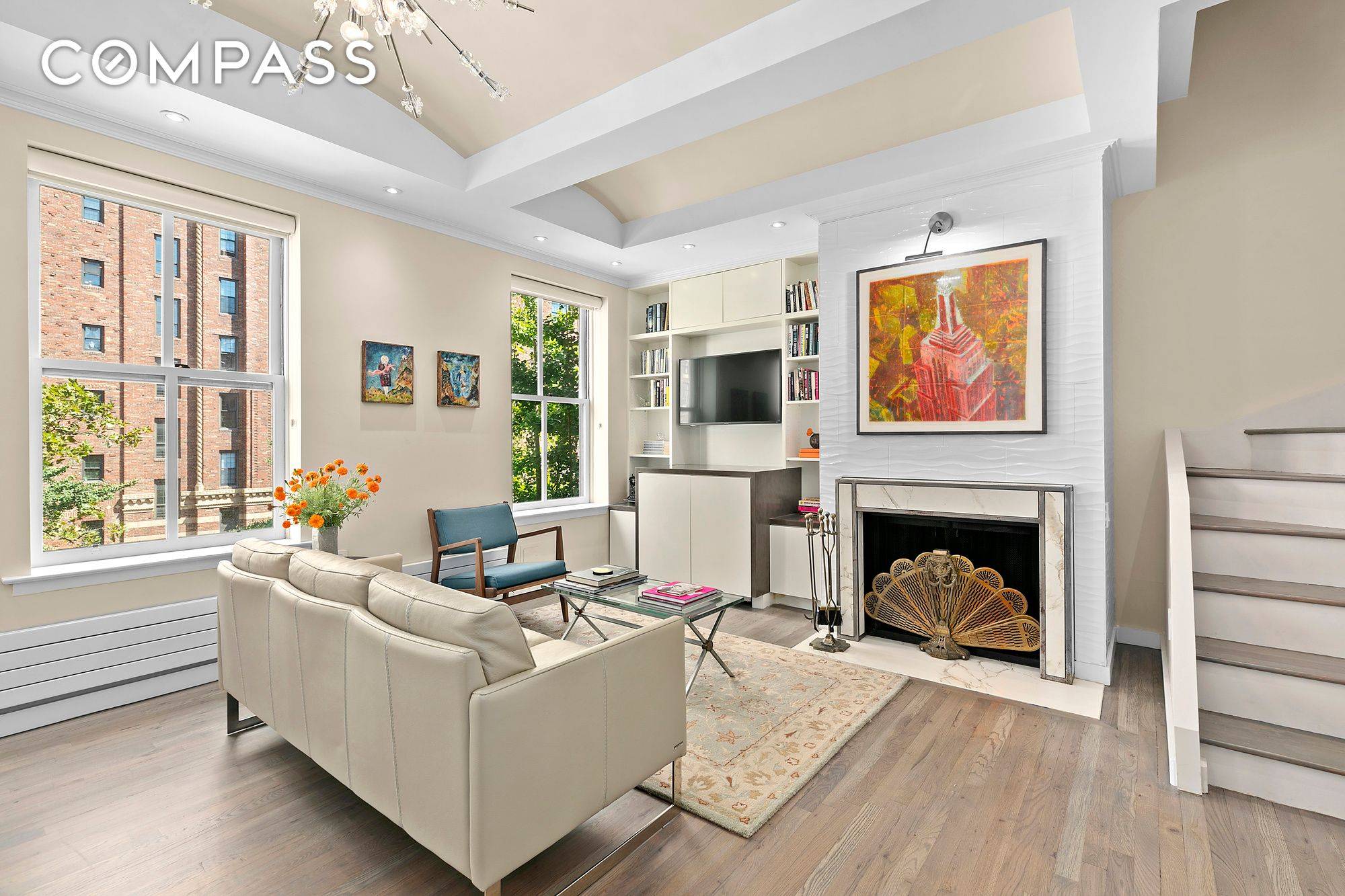 Top floor duplex with private roof deck on the coveted row of Fitzroy townhouses in West Chelsea.
