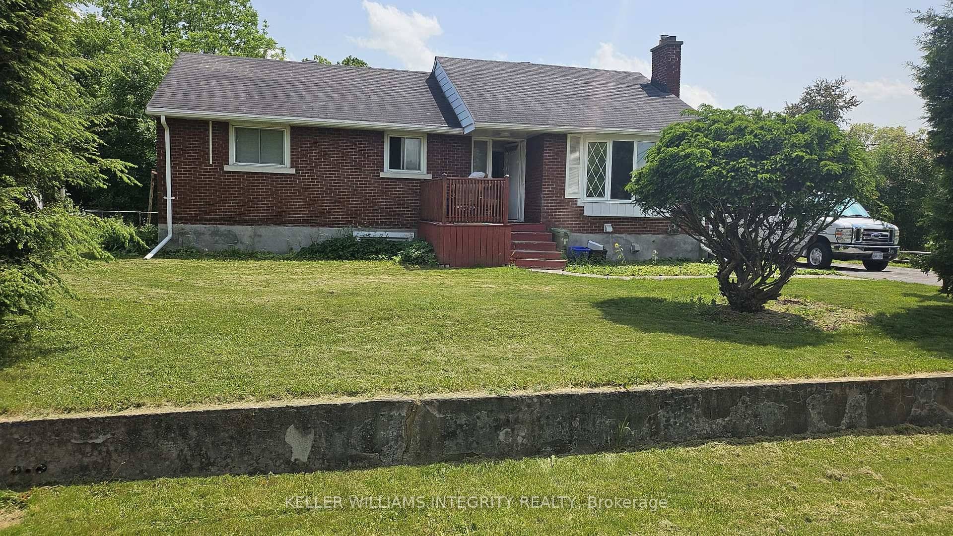 CASH FLOWING BUNGALOW WITH DEVELOPMENT POTENTIAL !