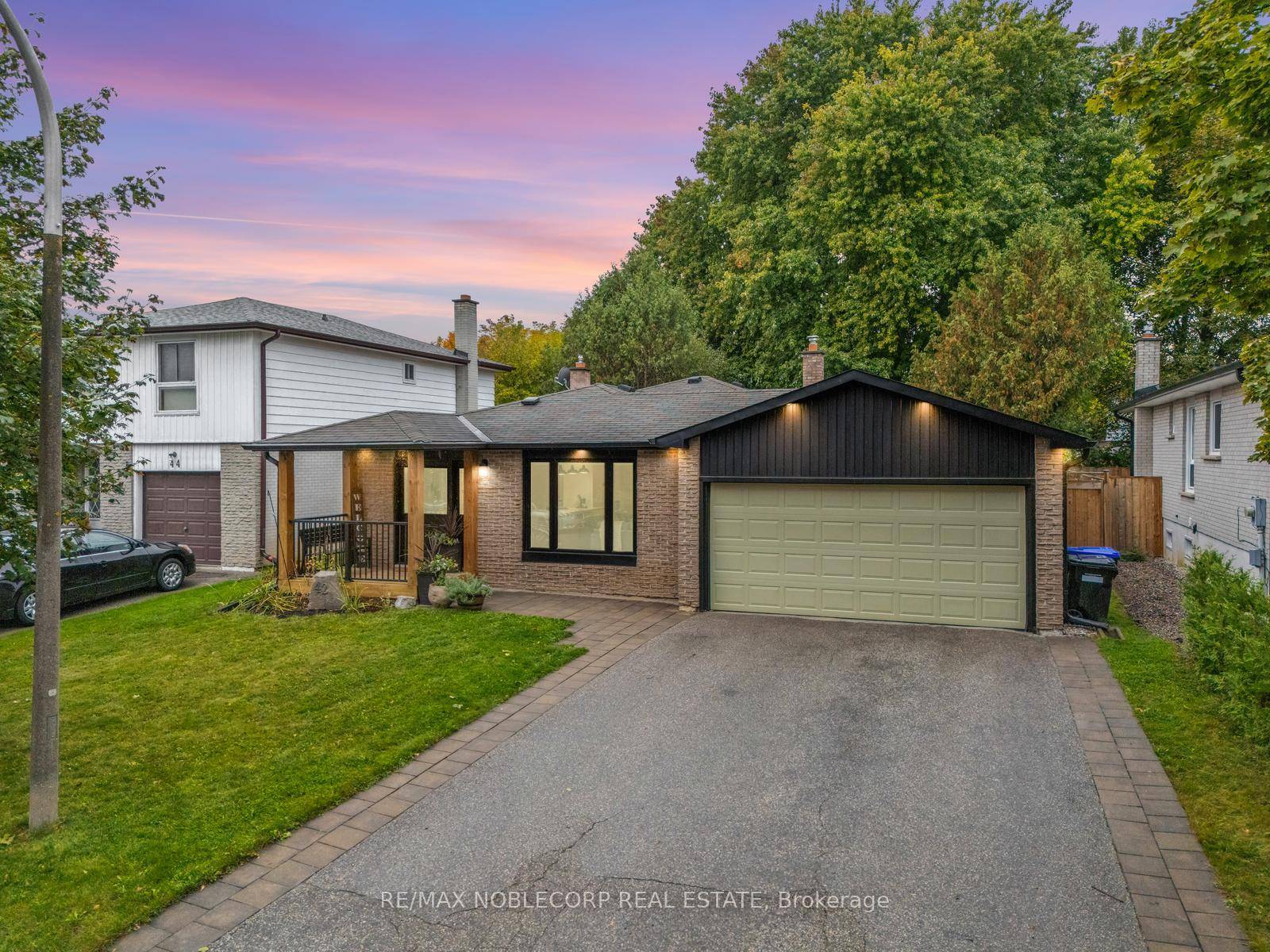 Welcome to 42 Mitchell Avenue, a beautifully renovated detached backsplit that effortlessly combines contemporary elegance with country charm.