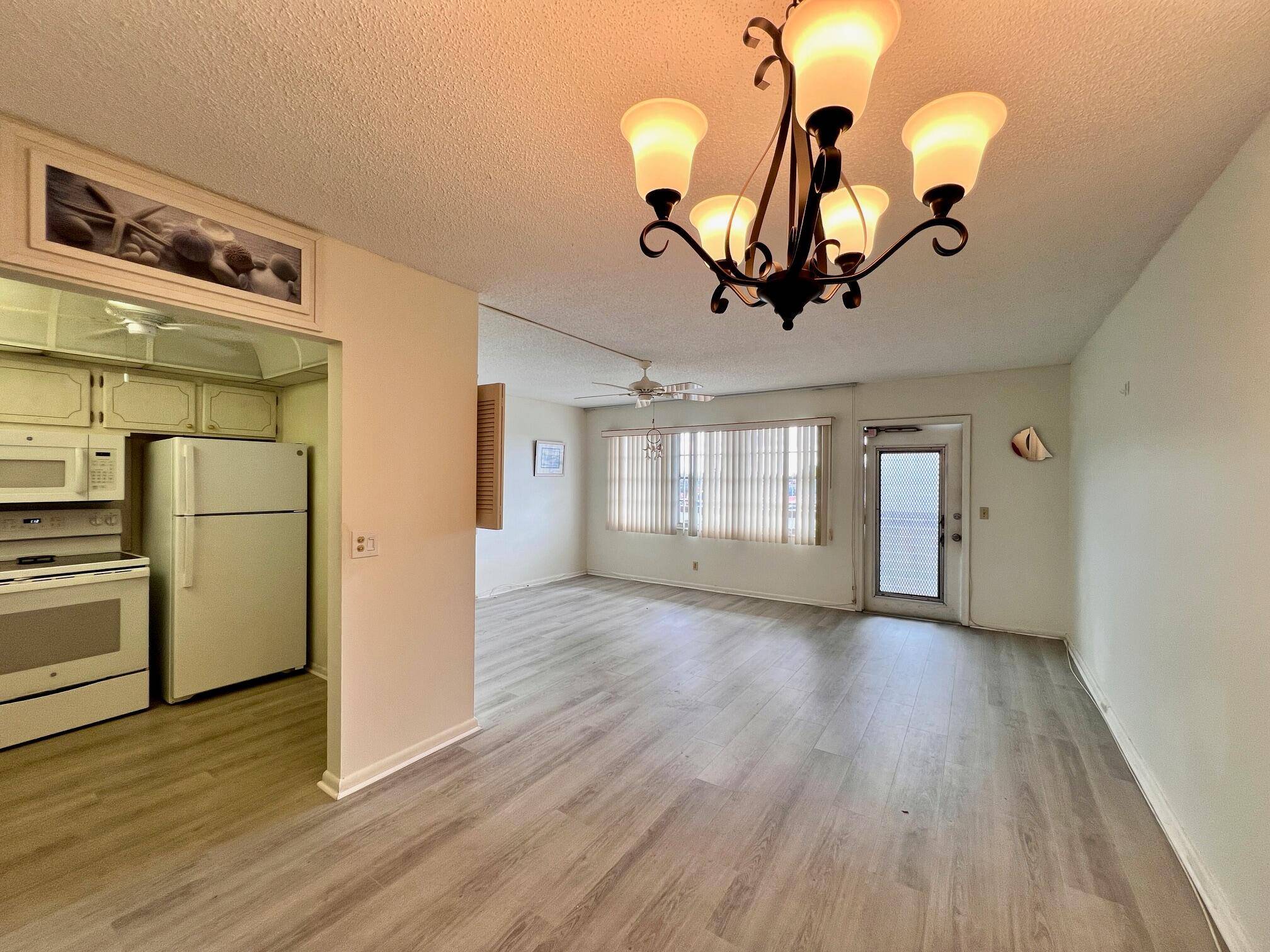 Bright Cheerful with New Water Views In 55 Century Village !