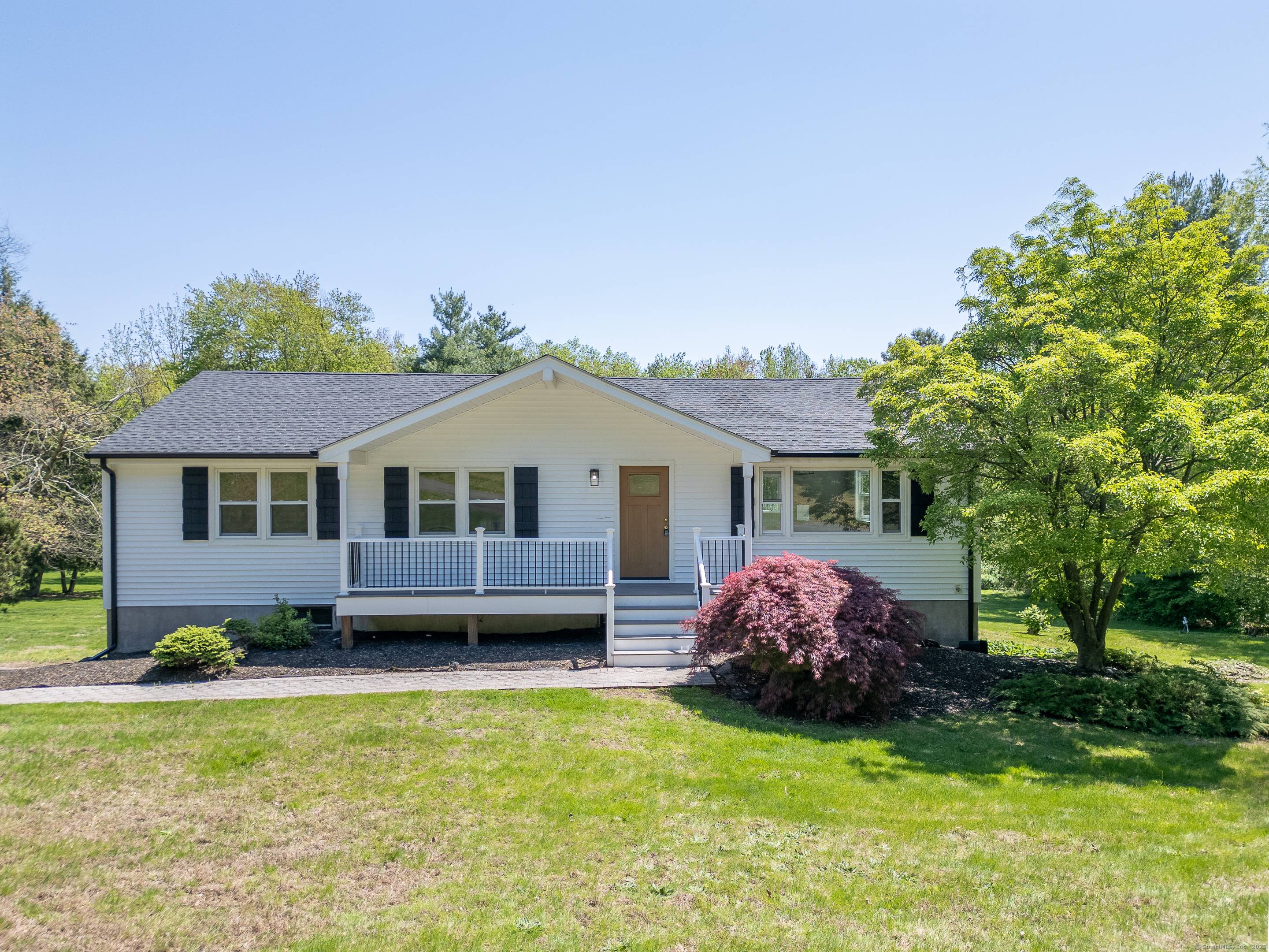 Welcome to 9 Punkin Dr, a beautifully renovated 3 bedroom, 3 bath raised ranch in Ellington, CT.