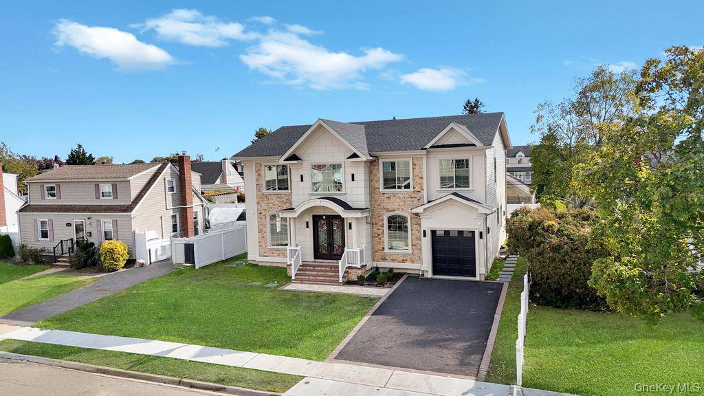 Welcome to this exquisite 5 bedroom, 4.