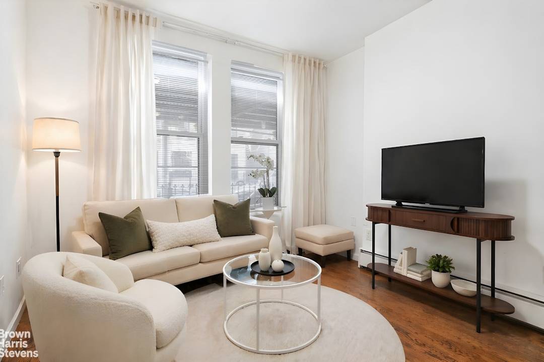 Experience the luxury of two story living in this meticulously renovated 1 bedroom, 1.