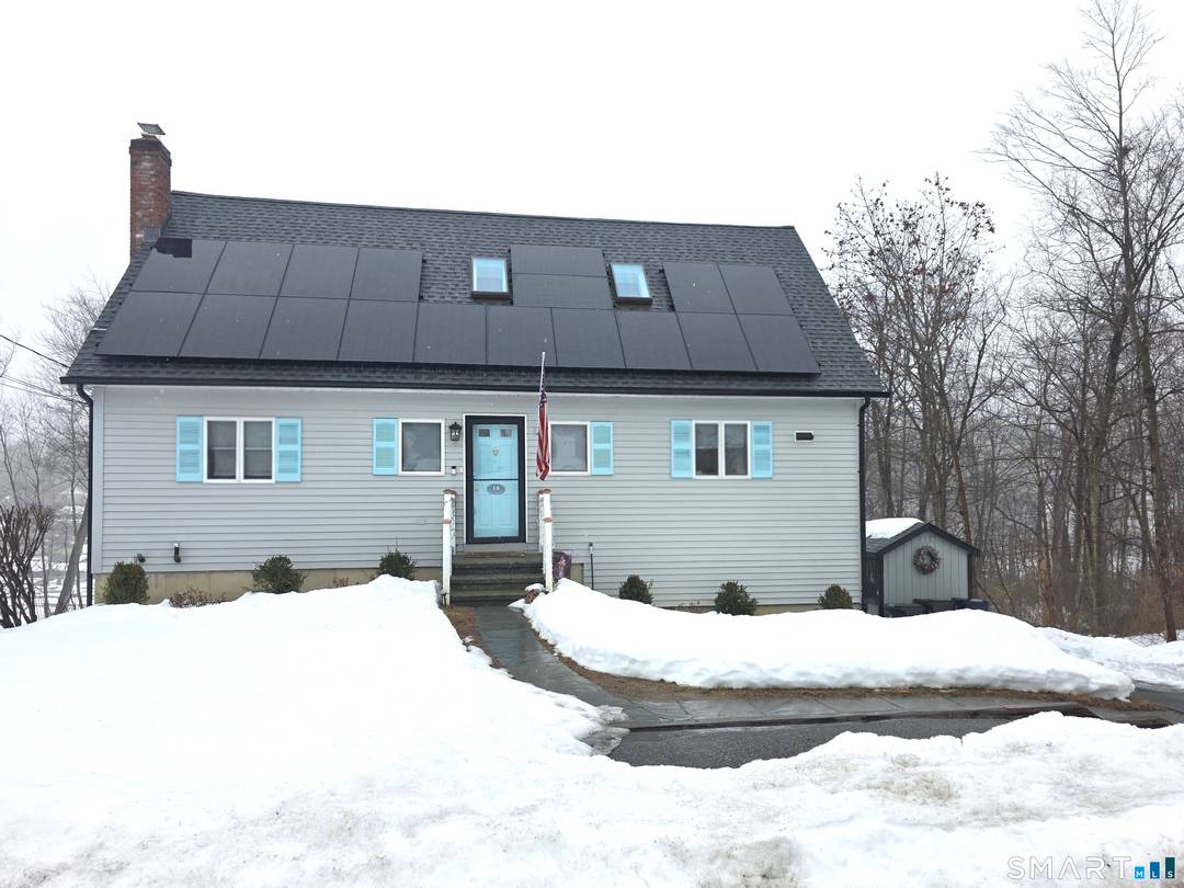 Discover this charming DIRECT WATERFRONT 3 level Cape style home in desirable Candlewood Shores.