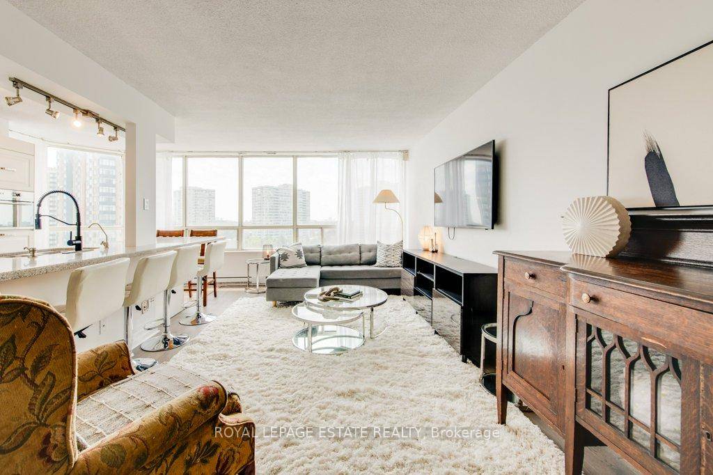 Welcome to this unbelievable sun drenched huge corner suite at Optima on the Park II !