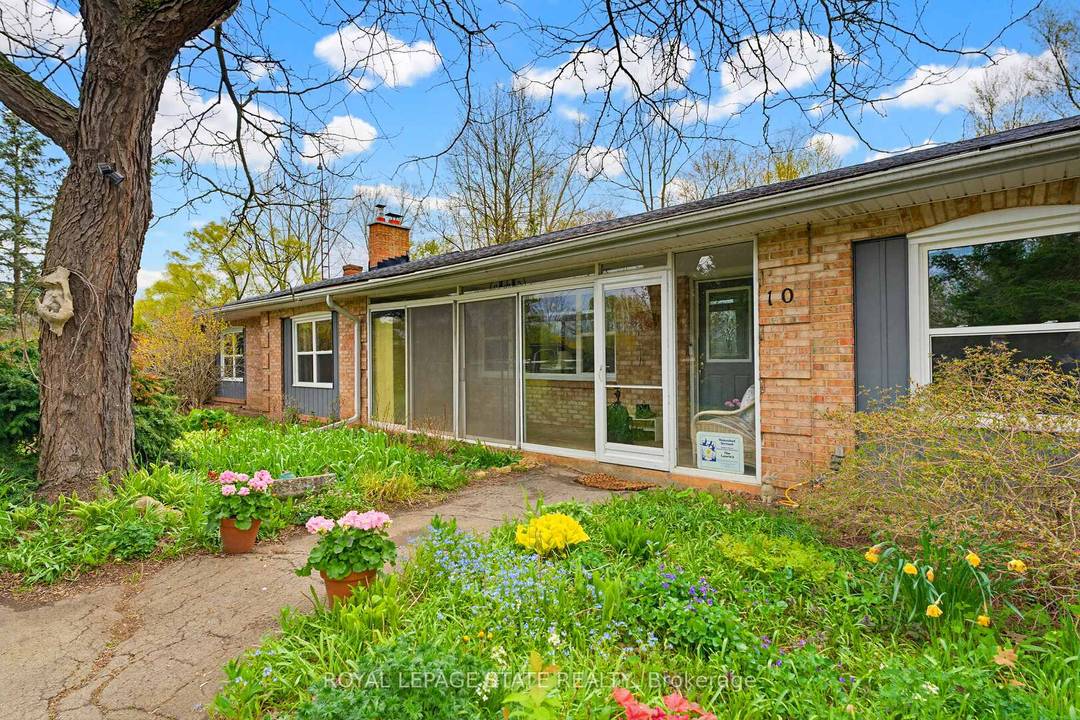 Set on approximately 10 acres in the heart of desirable Flamborough, this distinguished country estate offers a rare blend of refined rural living and a fully equipped equestrian facility.