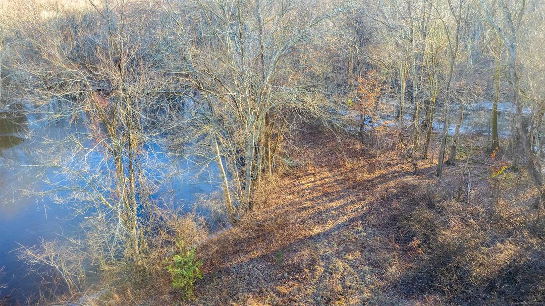 27 acres of serene land along the Aspetuck River spreading between Fairfield and Weston.