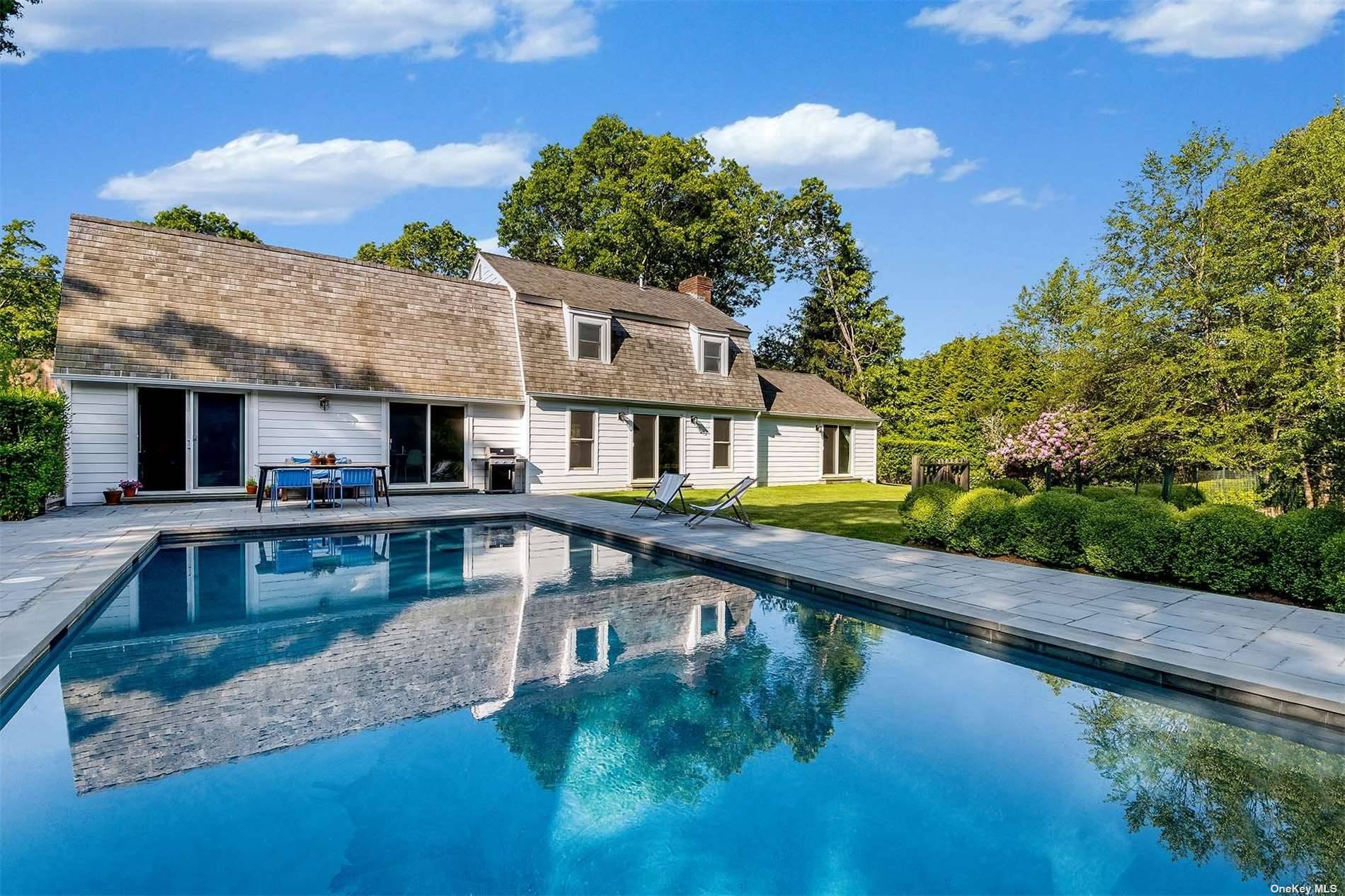 Stunning property located just outside of East Hampton Village on Squires Path, offering convenient access to its world class amenities, including boutique shops, restaurants, and the beach.