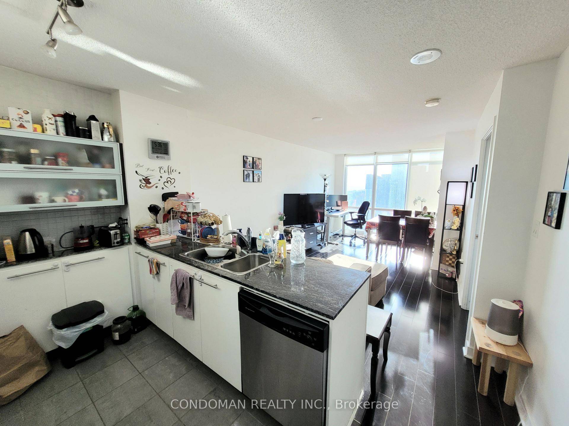 Perfectly laid out 1 den w parking locker amp ; open view of water !