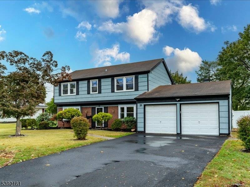 Beautiful home featuring a bright living room, formal dining room, and updated kitchen on the first floor.