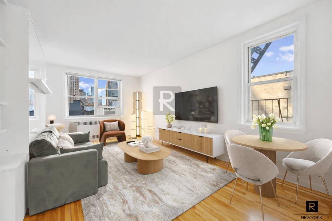 Welcome to Apartment 6K at 310 West 55th Street a sun filled, top floor studio offering exceptional light, privacy, and value in one of Manhattan s most convenient locations.