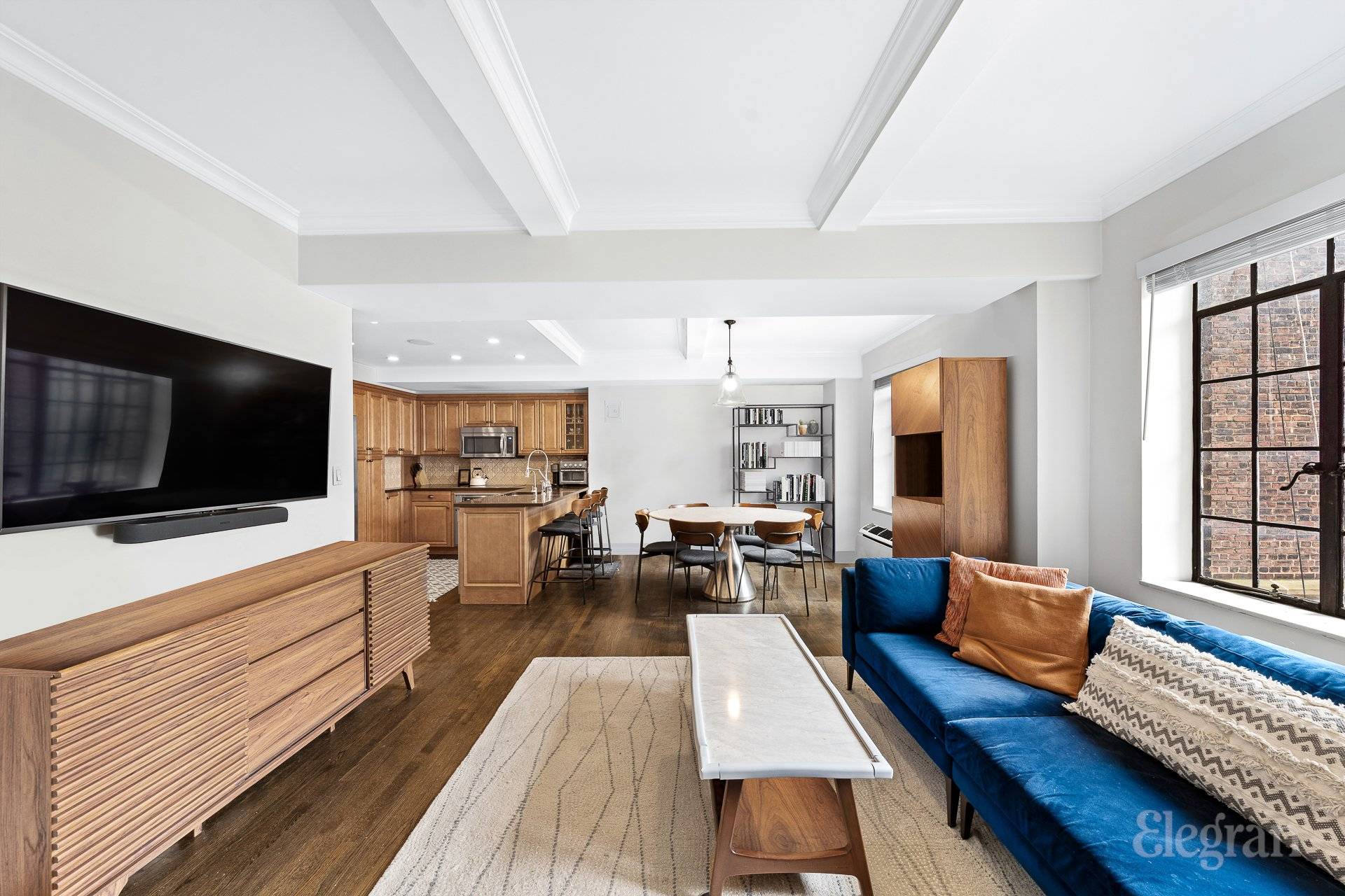 Welcome to 45 Tudor City Pl, Apt 1515 a beautifully renovated and sun drenched 1 bedroom plus convertible bedroom and home office with two full bathrooms.