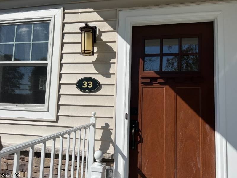 Beautifully renovated 3 bedroom, 2 full and 1 half bath side by side duplex offering four levels of finished living space.