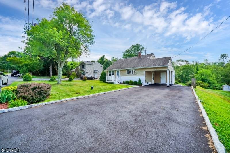 Cozy Comfortable with Lots of Updates, this front to back split level home has just over 1, 200 sq ft of living space with 3 bedrooms and 1.