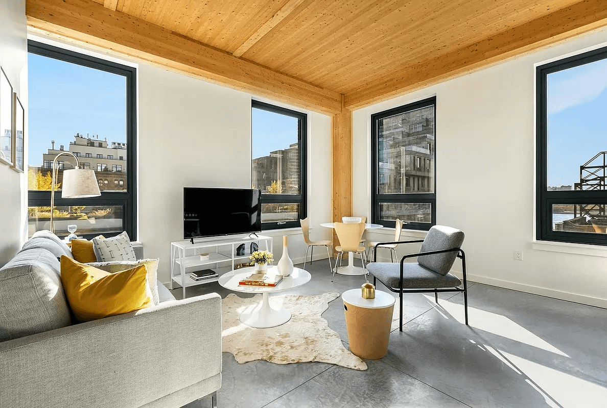 Luxury two bedroom Prime Williamsburg apartment with oversized private terrace and gorgeous views of the East River and Manhattan skyline.