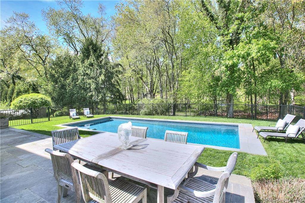 Walk to Compo Beach Longshore Club Park Metro North Saugatuck Center recently updated 5 BR Nantucket stone shingle home with gorgeous, fenced Gunite pool, situated in fabulous beach neighborhood but ...