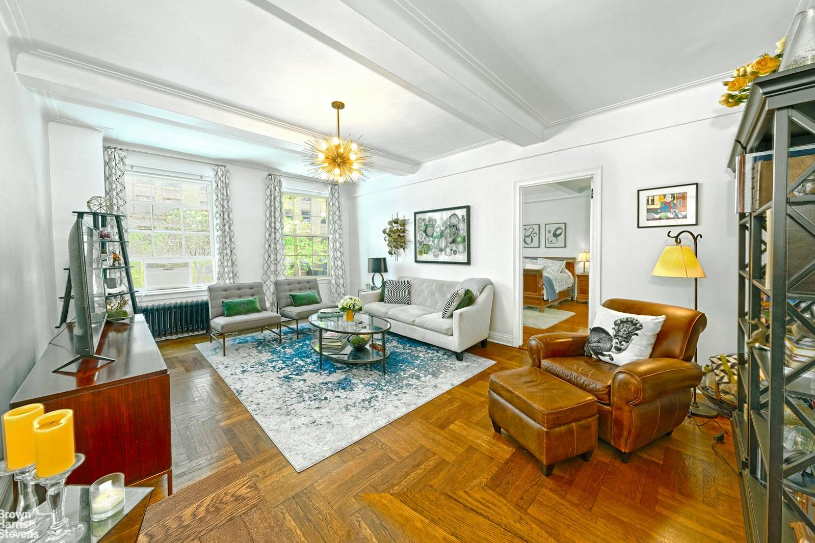 A wide, almost 14 feet deep entry foyer welcomes you to this charming two bedroom home with a great mix of pre war details and modern finishes.