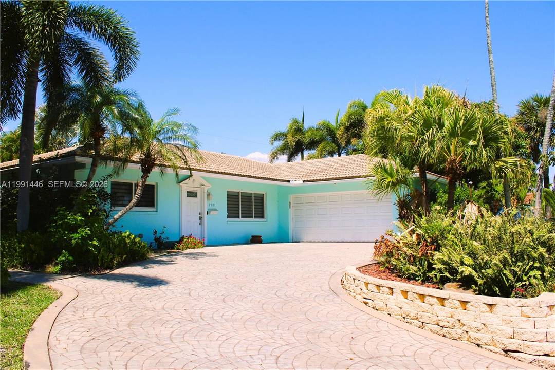 Beautifully updated and substantially remodeled residence in the prestigious gated community of Jenada Isle in Wilton Manors.