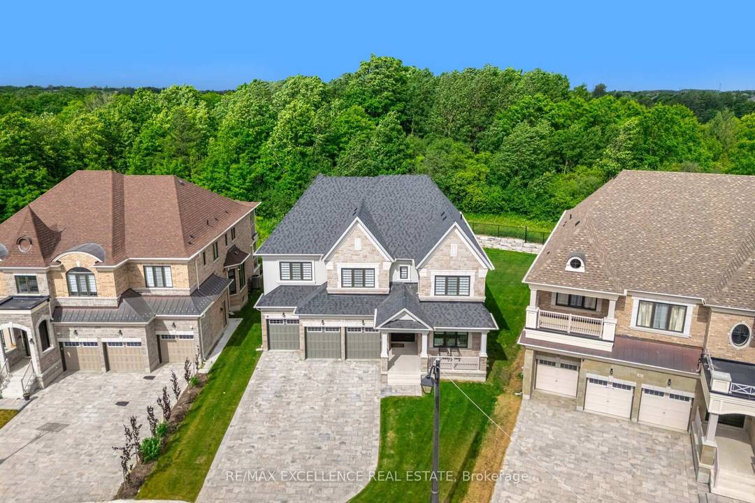 A rare opportunity to experience true luxury living on a premium pie shaped ravine lot, with 400K spent on the lot premium alone.