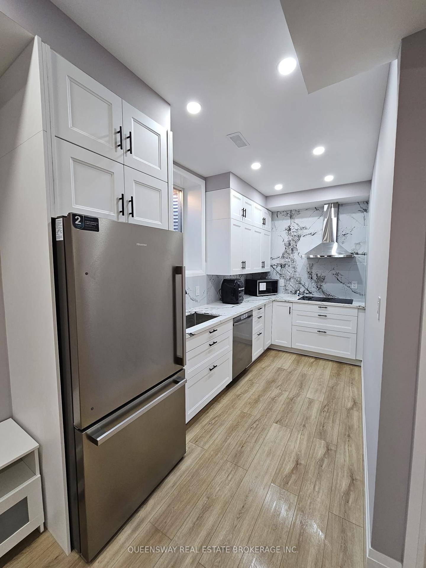 Bright and spacious 2 bedroom basement apartment with 9 ft ceilings, pot lights throughout, 1 full bathroom 1 powder room, a private entrance, and separate laundry.