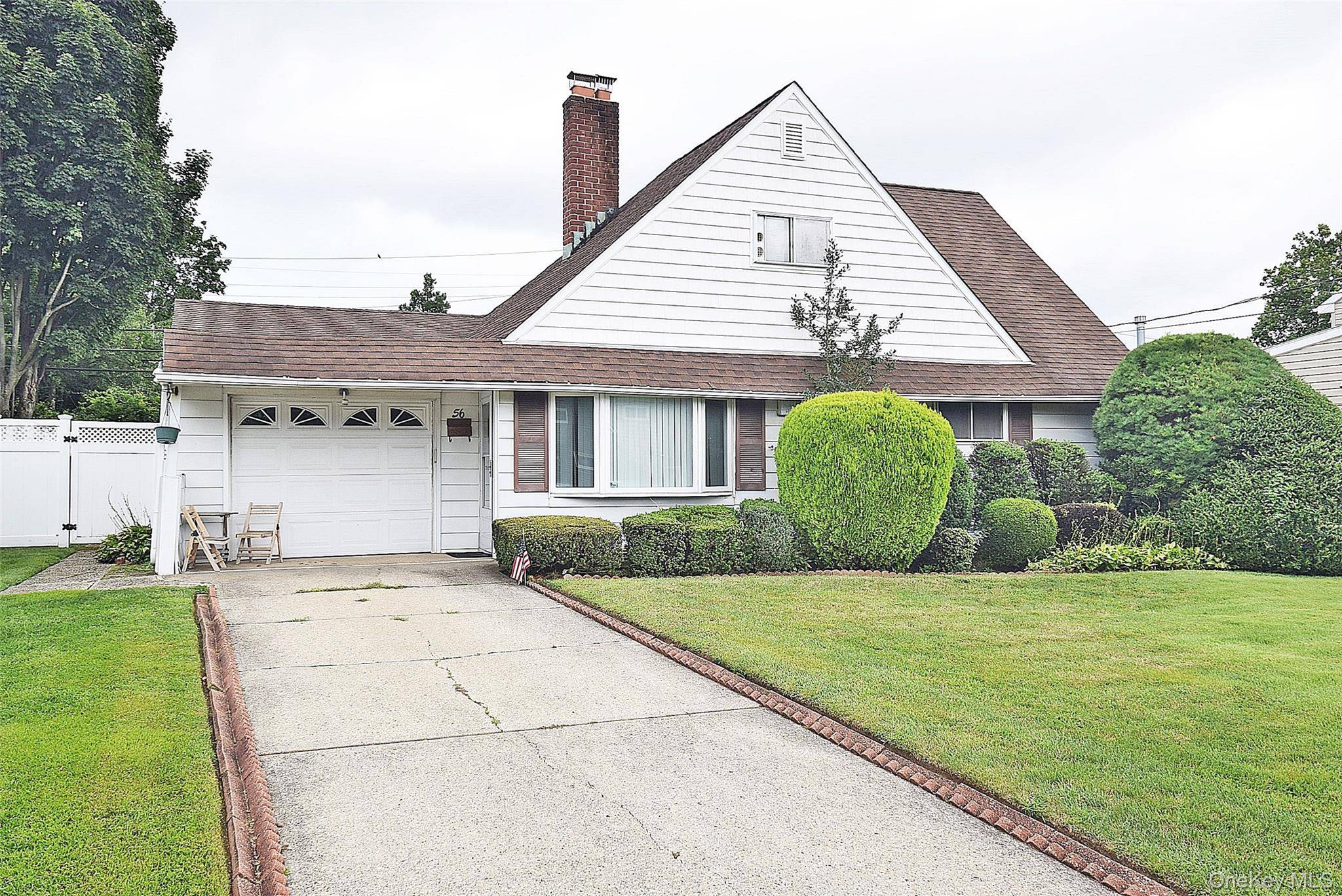 Welcome to this beautifully maintained and thoughtfully expanded ranch style home, nestled in the East Meadow School District.