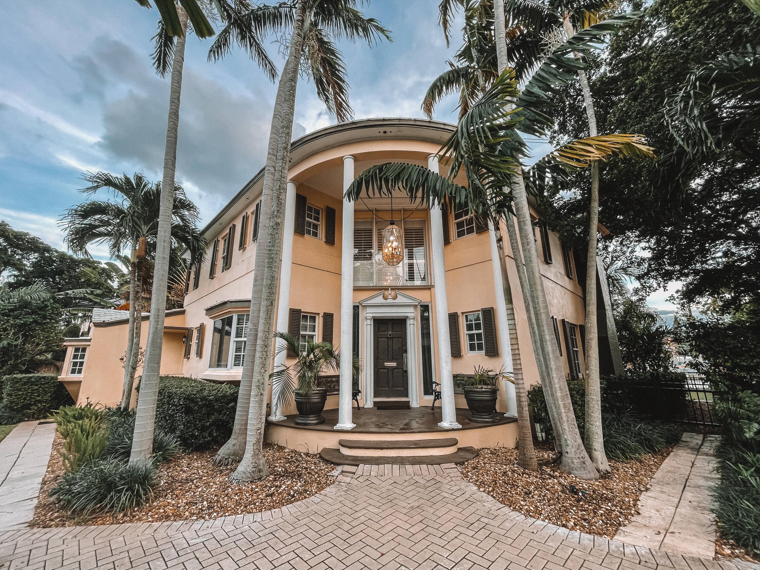 Nestled in prestigious Seven Isles, this 6 bed, 5.