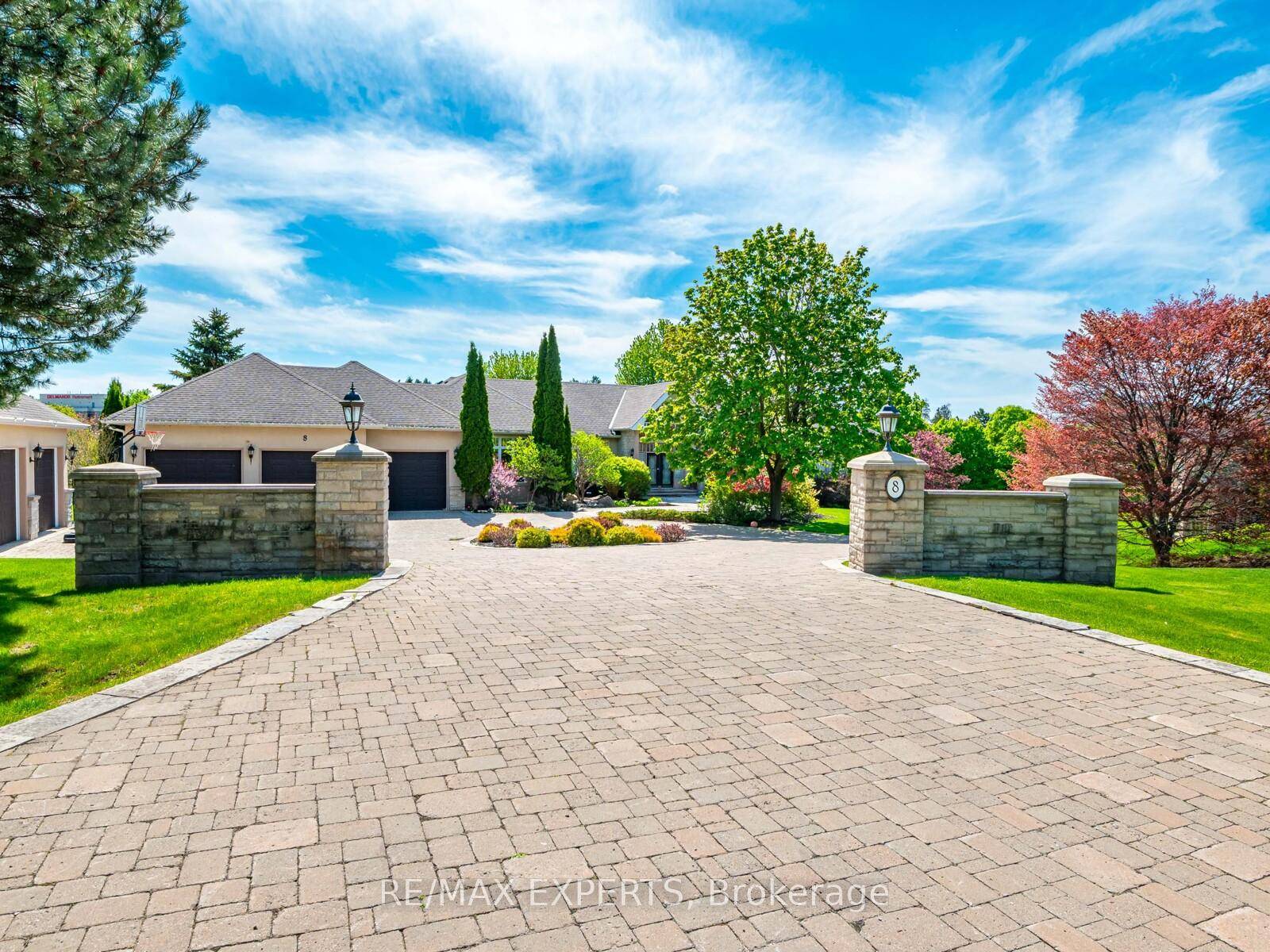 A Must Have for Sports Enthusiasts Previously Owned by Legendary Canadian Hockey Goaltender Curtis Joseph Welcome to this stunning executive bungalow nestled on nearly 2 acres in the prestigious enclave ...