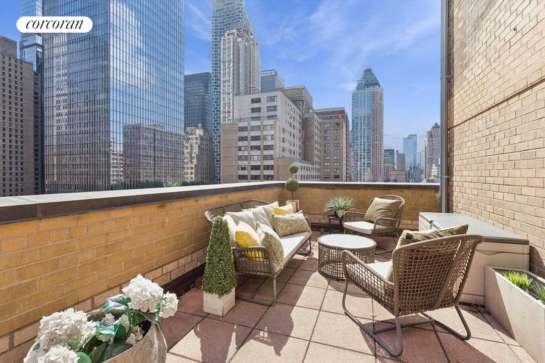 Truly one of a kind, this exquisitely renovated studio with a breathtaking outdoor space, is an entertainer's dream in the heart of Columbus Circle.