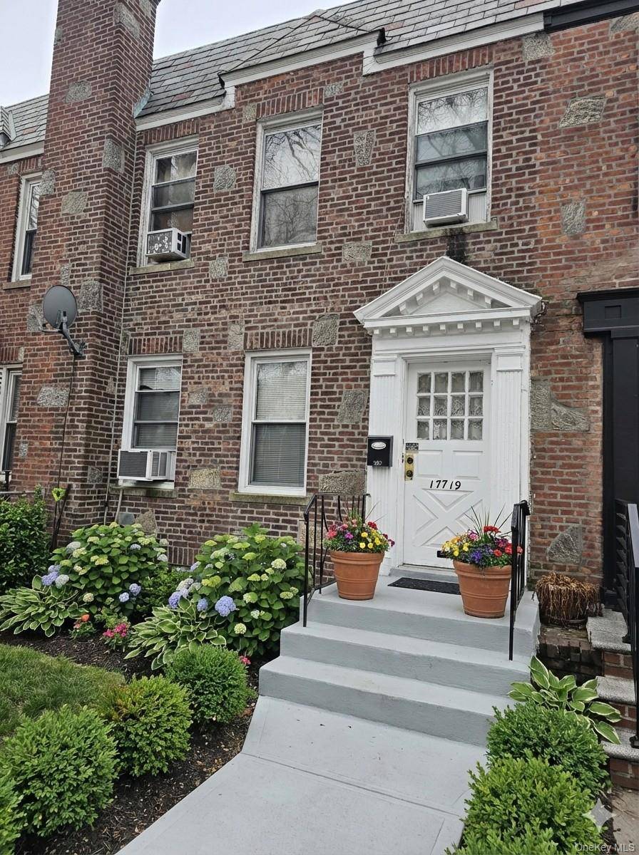 Well maintained attached brick two family home featuring a 1 bedroom unit on the first floor and a 2 bedroom unit on the second floor.