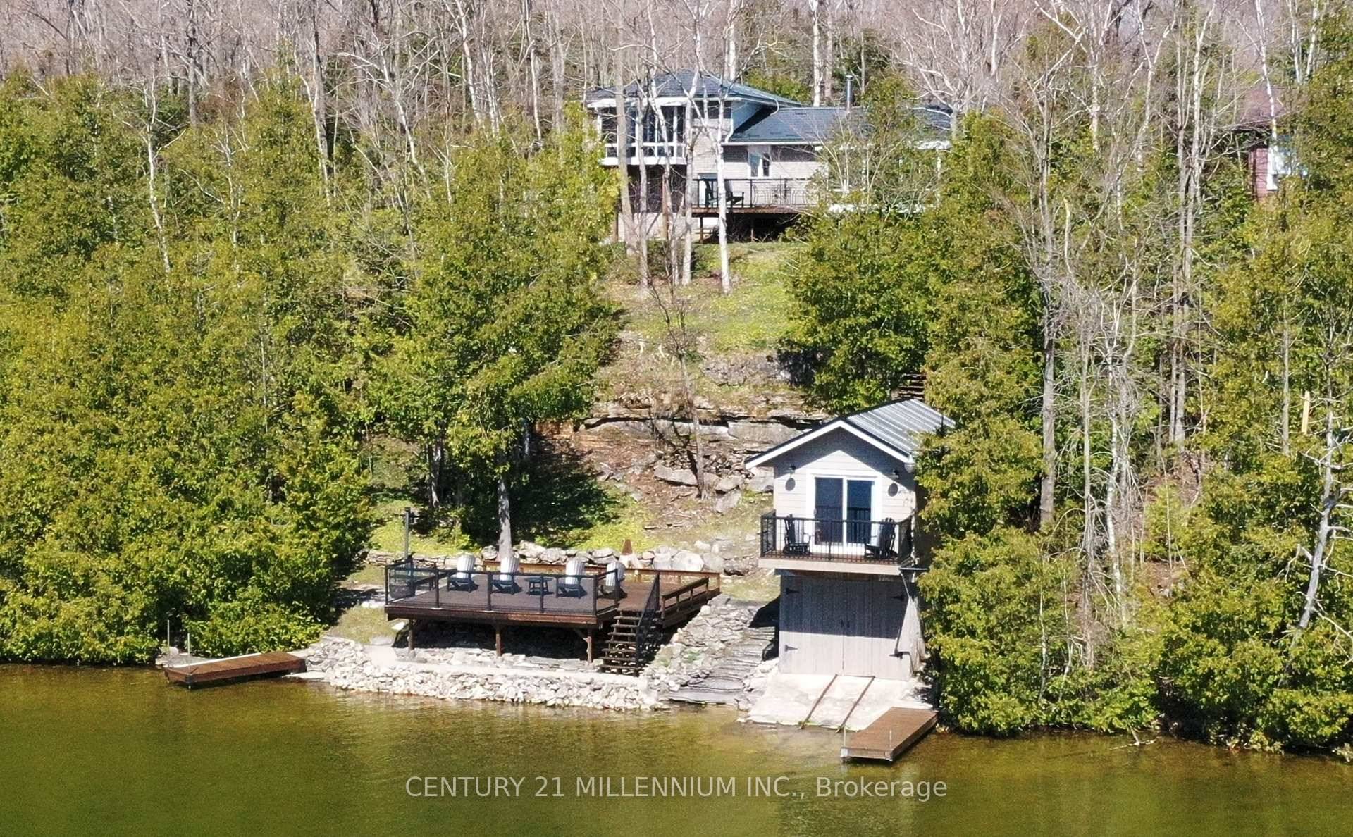 Magnificent Lake front full time home with boat house on sought after Miller Lake located between Lions Head amp ; Tobermory !