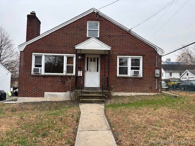 Centrally located three bedroom house with wood floors.