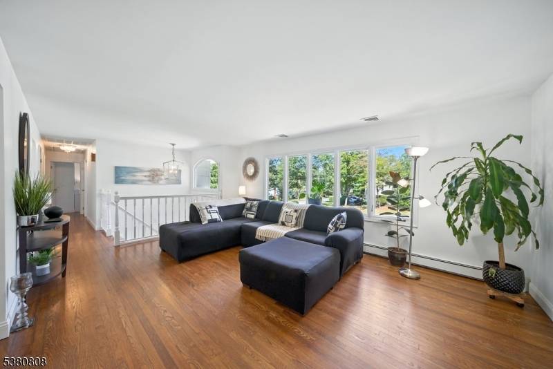 Welcome to 2 Cedar Ct., a beautifully updated 2, 200 sq ft bilevel on.