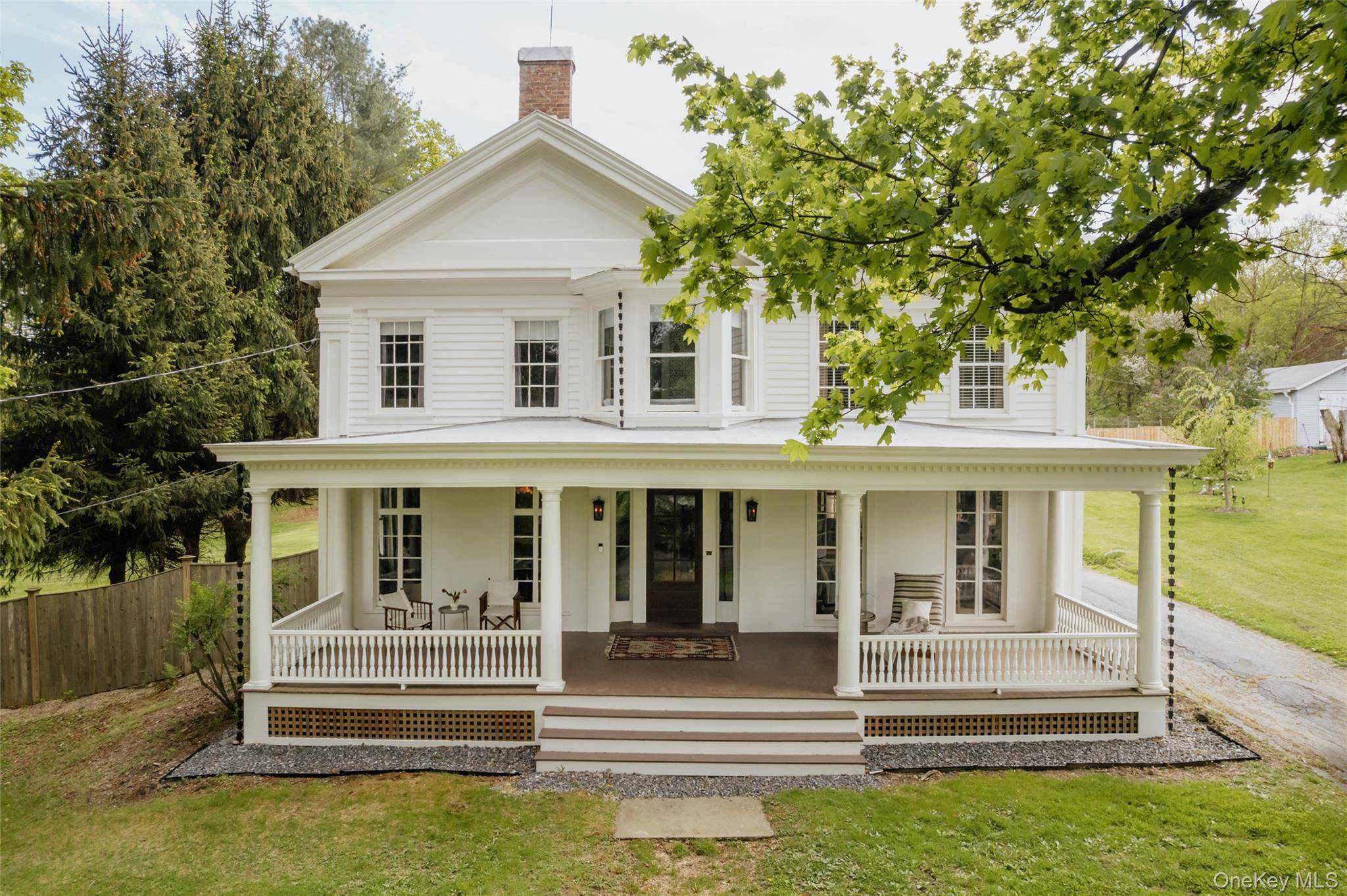 This handsome Greek Revival sits on a quiet street occupying a generous village lot in the historic Hamlet of Hillsdale.