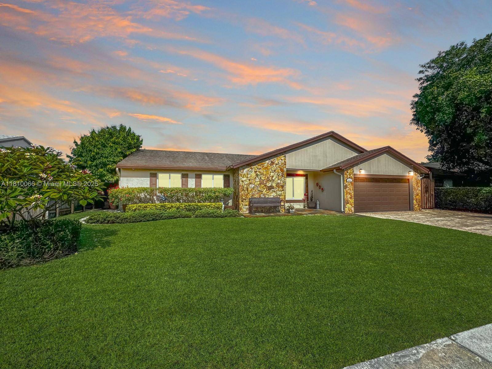 Beautiful 3 bed, 2 bath waterfront pool home nestled in the highly sought after Flamingo Gardens, Cooper City on oversized 13, 685 sq ft premium lot.