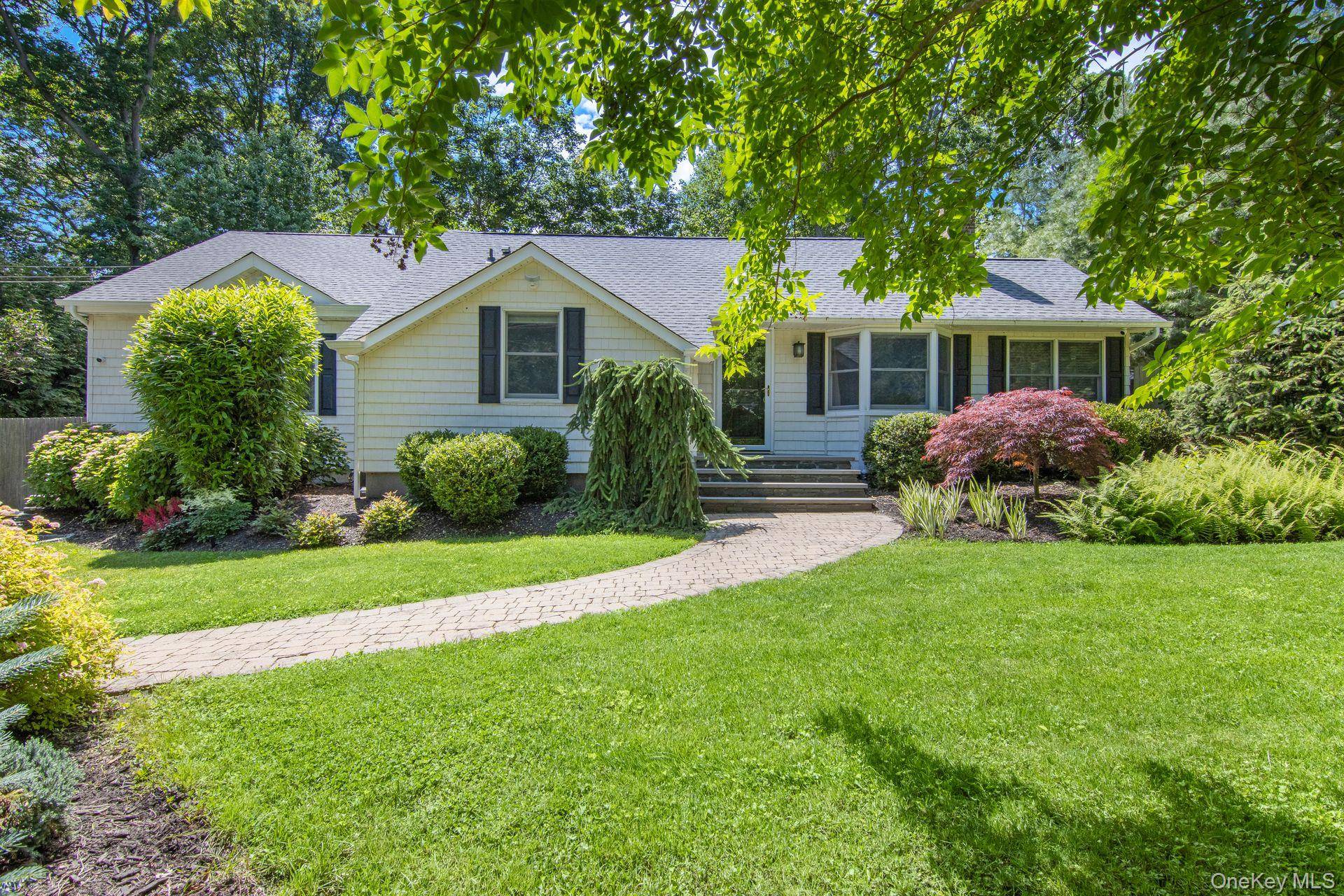 Just a short stroll. 40 mile to Stony Brook train station from this perfectly renovated ranch there is nothing left to do but move and enjoy this conveniently located home.