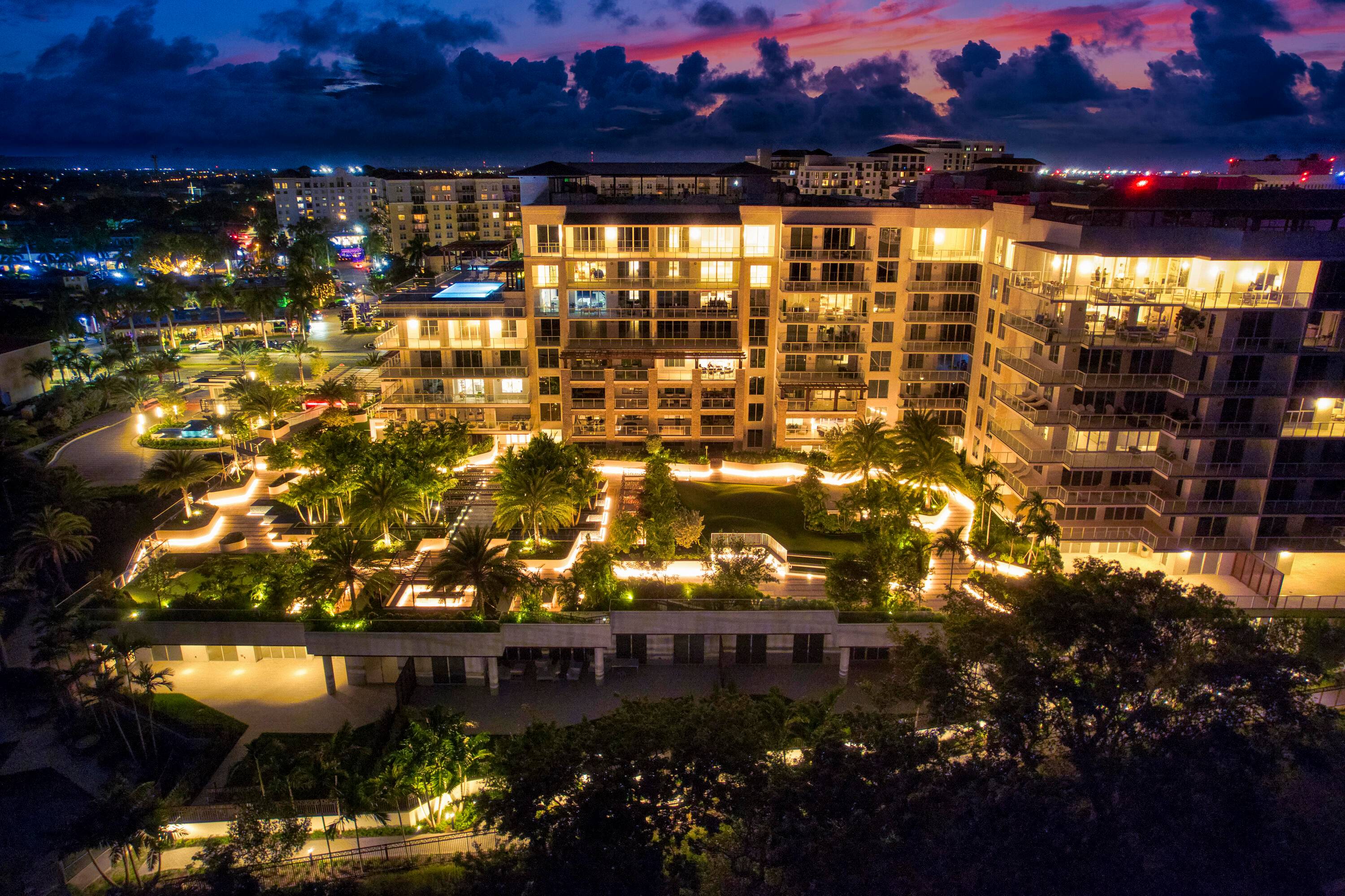 Immersed in verdant, canopied landscaping, offering panoramic fairway vistas and delivering a sense of tranquility and tropical ambience, this three bedroom masterpiece, with 4, 299 total square feet, features an ...