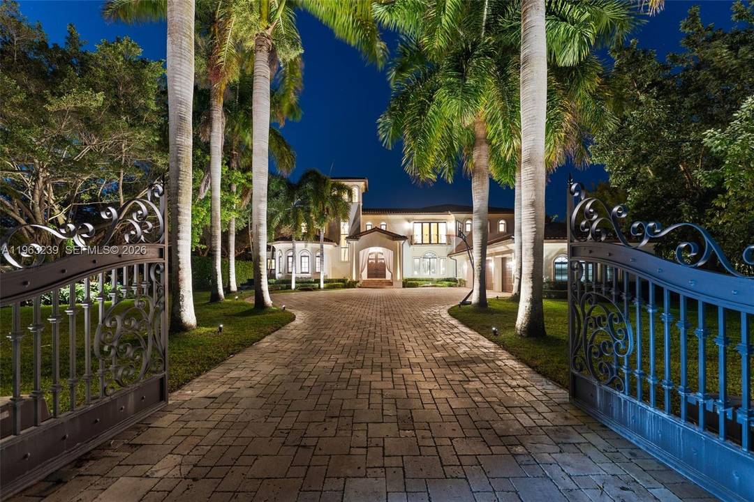 Mediterranean masterpiece on secluded Killian Park Rd in the heart of Pinecrest.