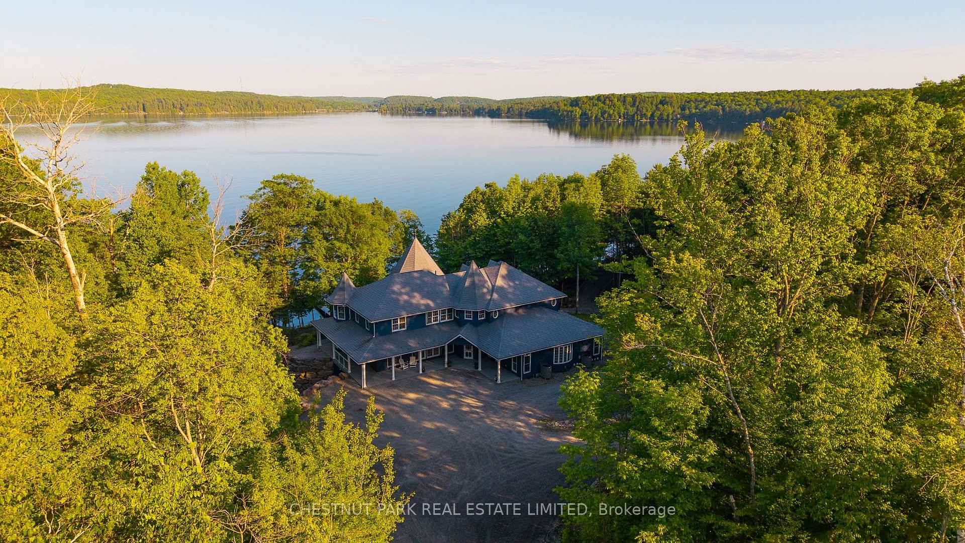 Set on just under six acres on Boshkung Lake in the heart of the Haliburton Highlands, this private estate blends luxury waterfront living with timeless natural beauty.